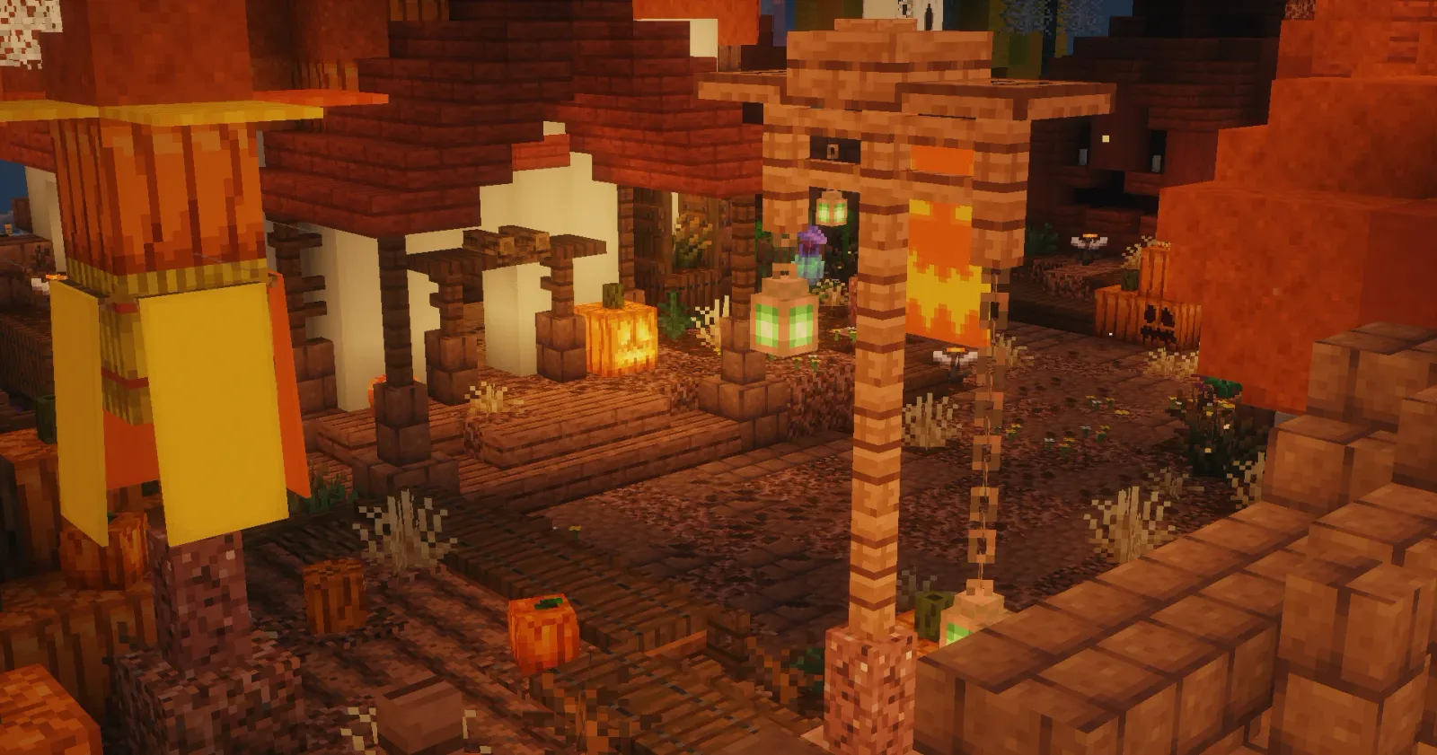 An autumn village in the KiwiSMP Halloween lobby with lanterns, pumpkins and fallen leaves